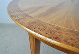 Danish round golden elm, walnut burl and birch end or side table.
