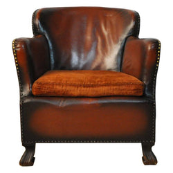 Club chair with original leather from 1920s