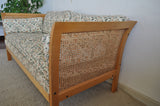 Rotang 2 seater sofa by Arne Norell. Side sections and back with woven cane