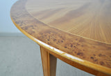 Danish round golden elm, walnut burl and birch end or side table. 
