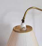 Art deco floor lamp in brass and browned brass with original shade