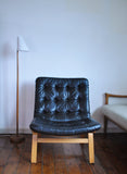 Black leather lounge chair by Farstrup Møbler. Leather upholstery in a fine condition.