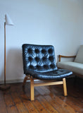 Black leather lounge chair by Farstrup Møbler. Leather upholstery in a fine condition.