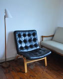 Black leather lounge chair by Farstrup Møbler. Leather upholstery in a fine condition.