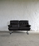 Dark brown leather and chrome 2 seater sofa by Arne Norell
