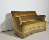 Curved Early 20th Century Sofa with original upholstery in green and yellow tones