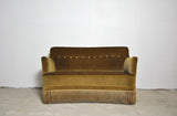 Curved Early 20th Century Sofa with original upholstery in green and yellow tones