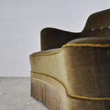 Curved Early 20th Century Sofa with original upholstery in green and yellow tones