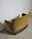 Curved Early 20th Century Sofa with original upholstery in green and yellow tones