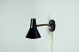 Scandinavian Modern Danish wall lamp with adjustable brass arm