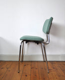 Danish side chair by Duba, chromed frame and new Upholstery