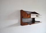 Danish Modern Wall Mounted Storage in teak and rosewood