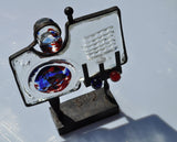 Glass and metal sculpture