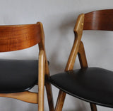 Dining chairs by Henning Kjærnulf, set of 2