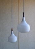 Holmegaard minimalistic hanging lamp in opaline glass and teak, set of 2