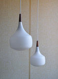 Holmegaard minimalistic hanging lamp in opaline glass and teak, set of 2
