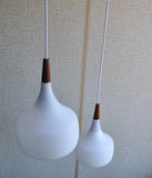 Holmegaard minimalistic hanging lamp in opaline glass and teak, set of 2