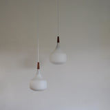 Holmegaard minimalistic hanging lamp in opaline glass and teak, set of 2