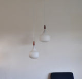 Holmegaard minimalistic hanging lamp in opaline glass and teak, set of 2