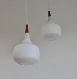 Holmegaard minimalistic hanging lamp in opaline glass and teak, set of 2