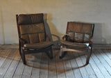 A pair of norwegian easy chairs