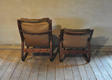 A pair of norwegian easy chairs