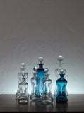 Holmegaard "Klukflasker", Set of 7 Mouth Blown Cluck Bottles or Decanters