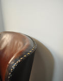 Club chair with original leather from 1920s