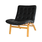 Black leather lounge chair by Farstrup Møbler. Leather upholstery in a fine condition.