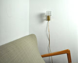 Mid-Century Modern wall light in solid teak, brass and glass shade attributed to Carl Fagerlund for Orrefors. 