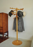 The iconic sculpturel freestanding coat and hat hanger is design by Nanna Ditzel