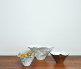 Bowls of white porcelain, partially gilded by Violise Lunn for Royal Copenhagen