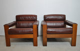 Scandinavian leather and oak lounge chairs, 1970s
