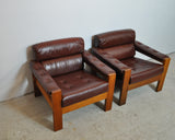 Scandinavian leather and oak lounge chairs, 1970s