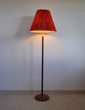 Walnut floor lamp with brass details