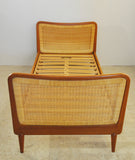 Mid Century teak bed with woven cane head- and footboard