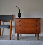 Teak chest of drawers with three drawers. 
