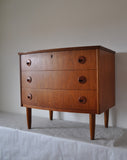 Teak chest of drawers with three drawers. 