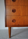 Teak chest of drawers with three drawers. 