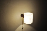 Swedish teak and acrylate wall lamp designed by Uno & Östen Kristiansson and manufactured by Luxus, Sweden