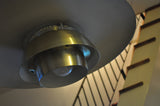 A classic Danish multilayered brass pendant light