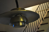 A classic Danish multilayered brass pendant light